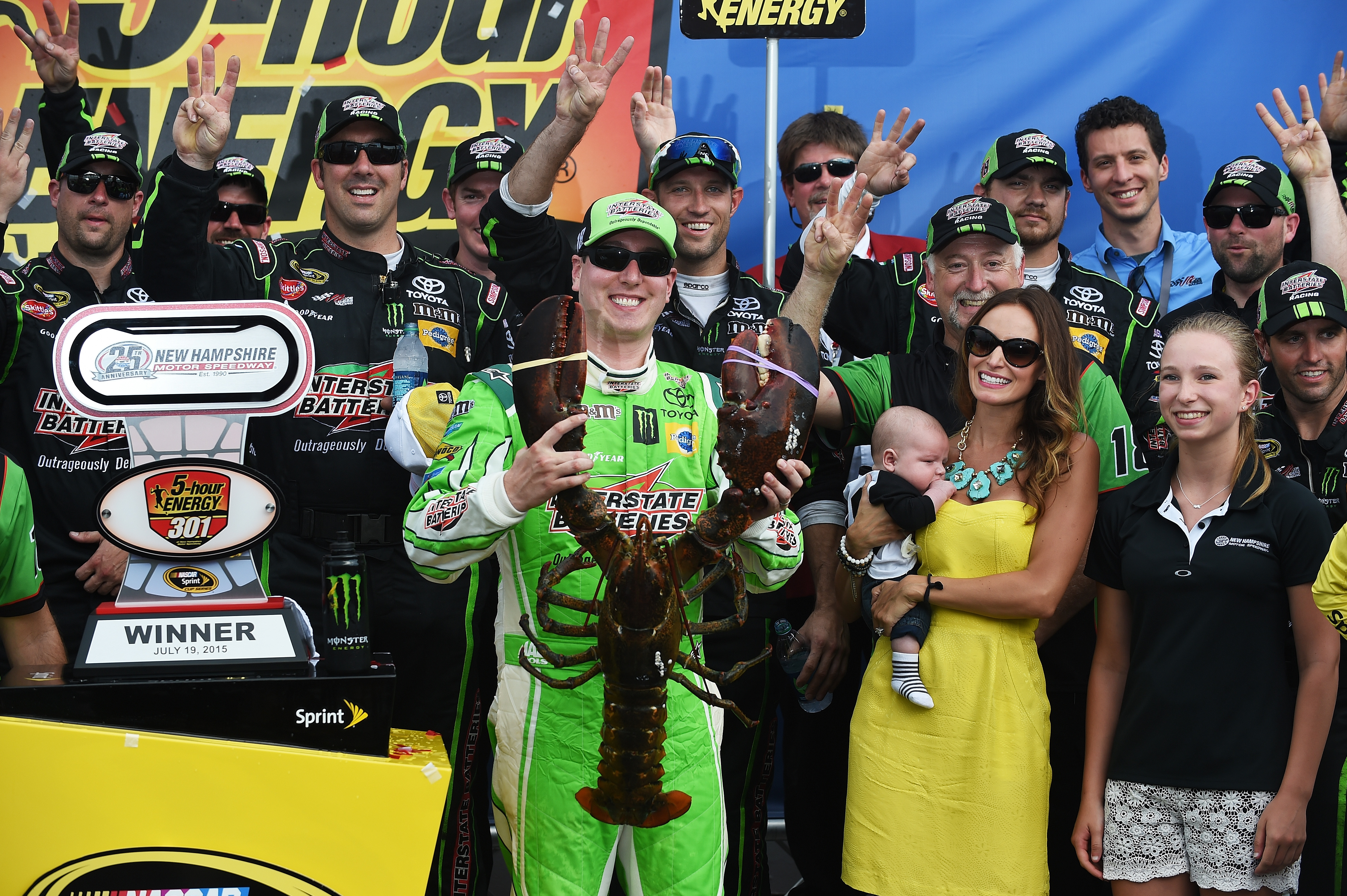 Kyle Busch and Samantha with the Loudon lobster trophy, 2015.