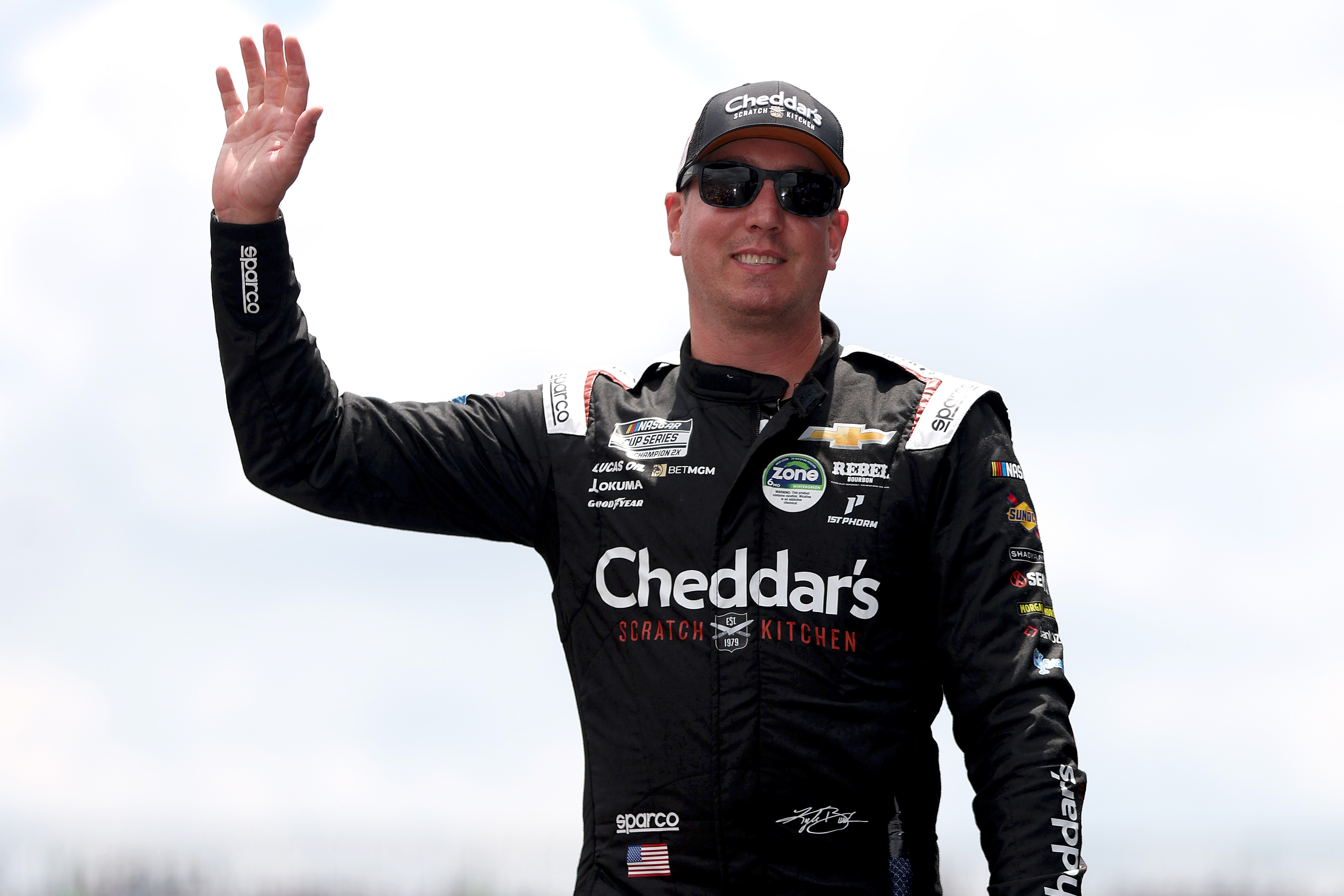 Kyle Busch waves to fans at Dover, July 2025.