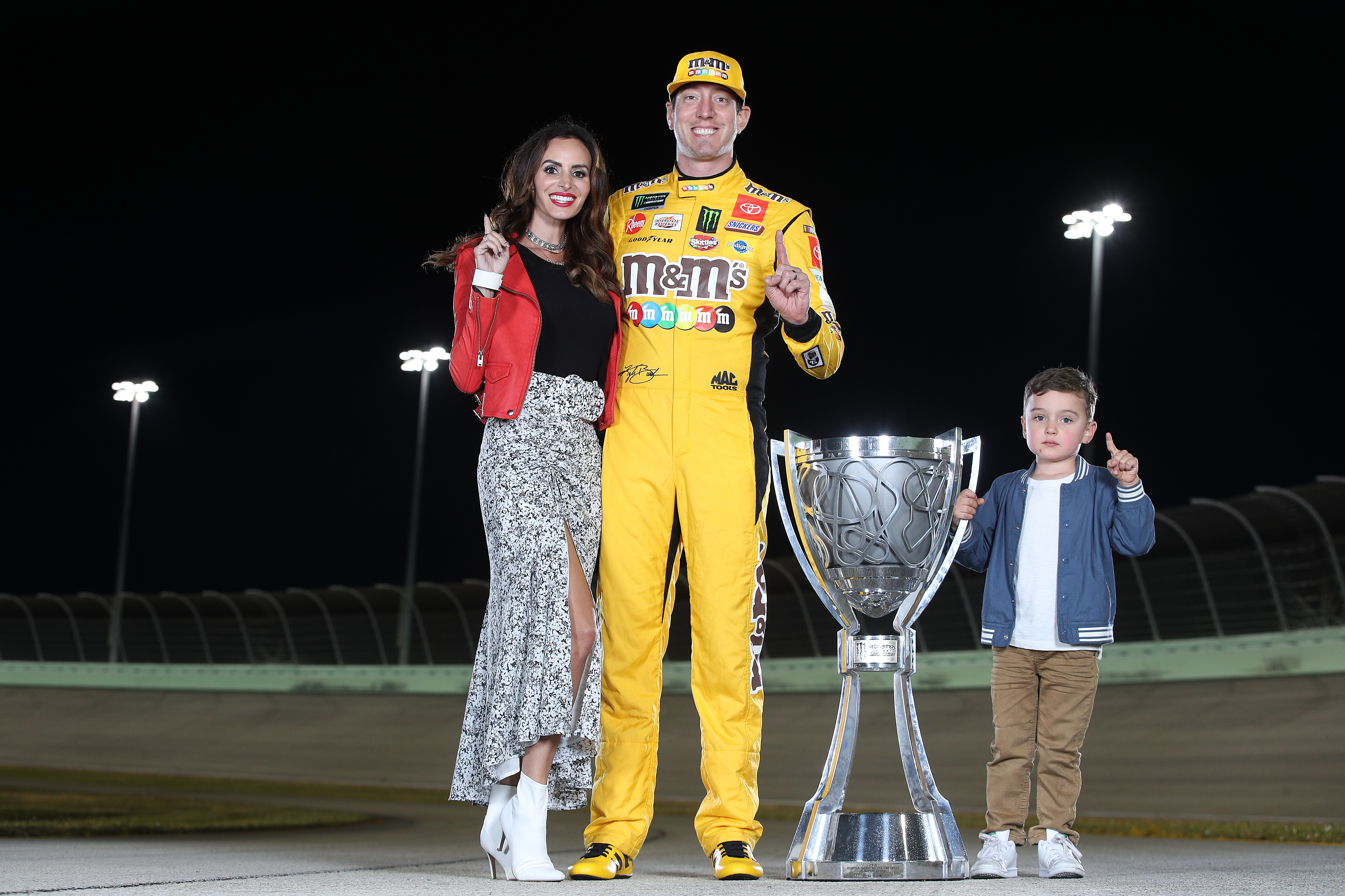 Kyle Busch with Samantha and Brexton after the 2019 championship.