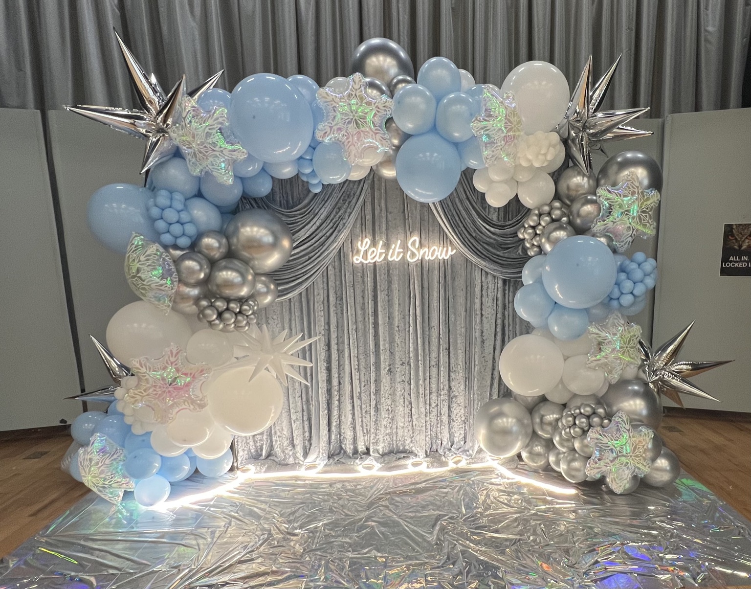 Winter snowflake balloon and draping backdrop by Vive POP