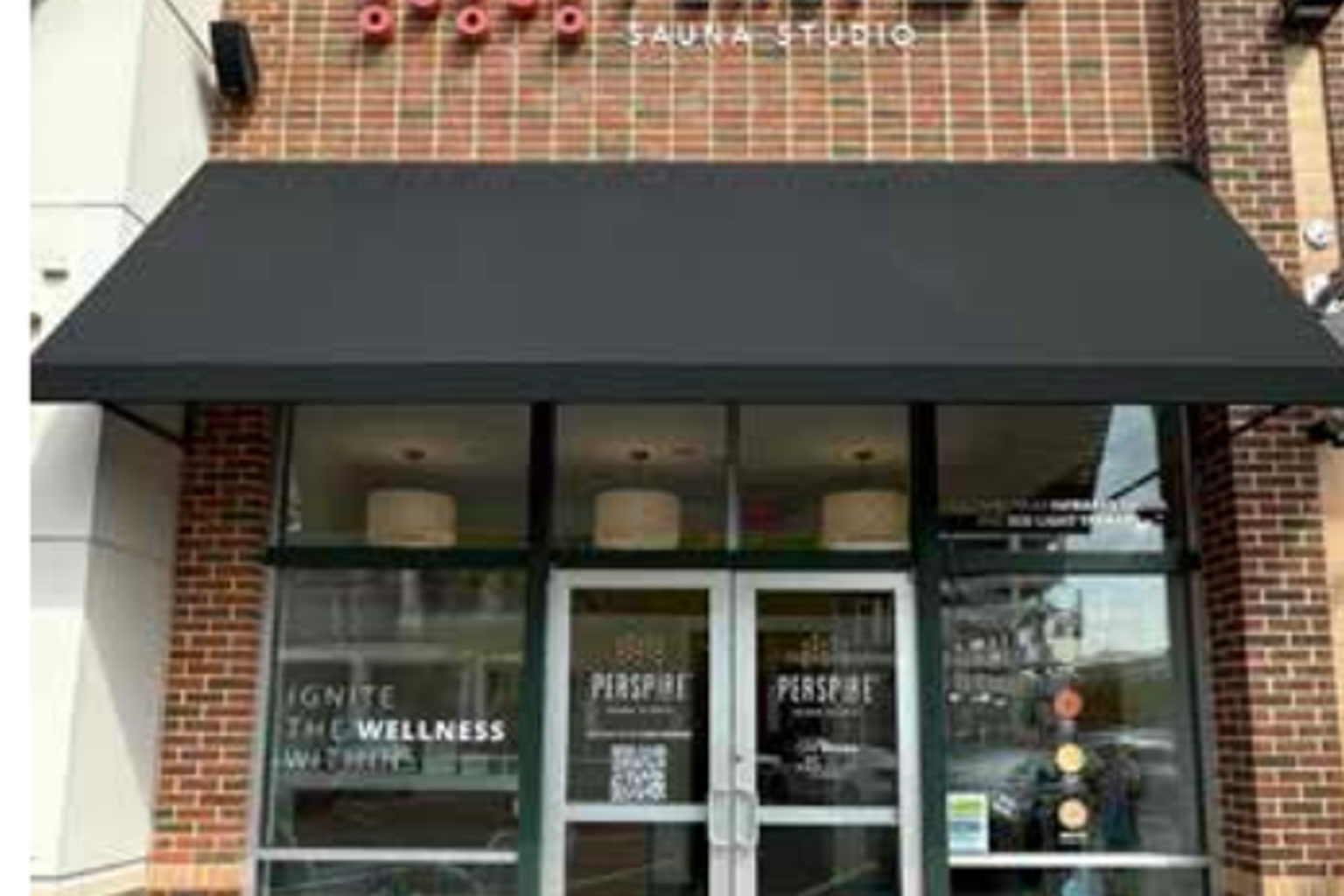The Perspire Sauna Studio storefront in Ballantyne Village